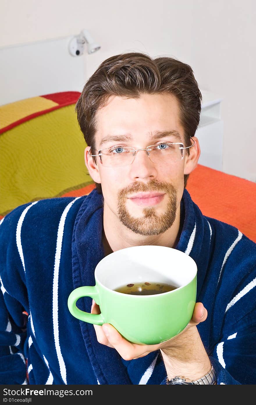 Young Man Drinking His Morning Tea