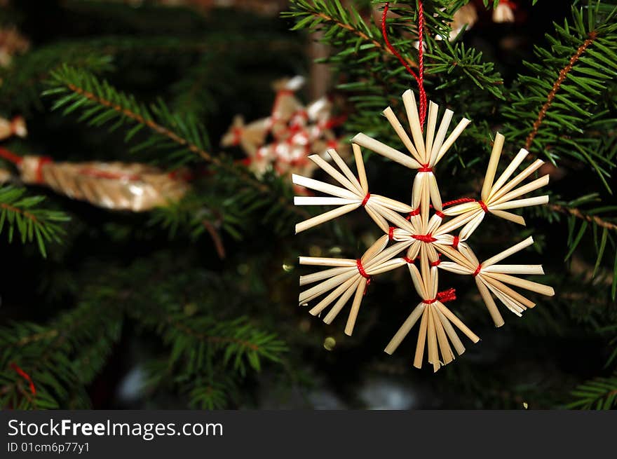 A straw star on the Christmas Tree