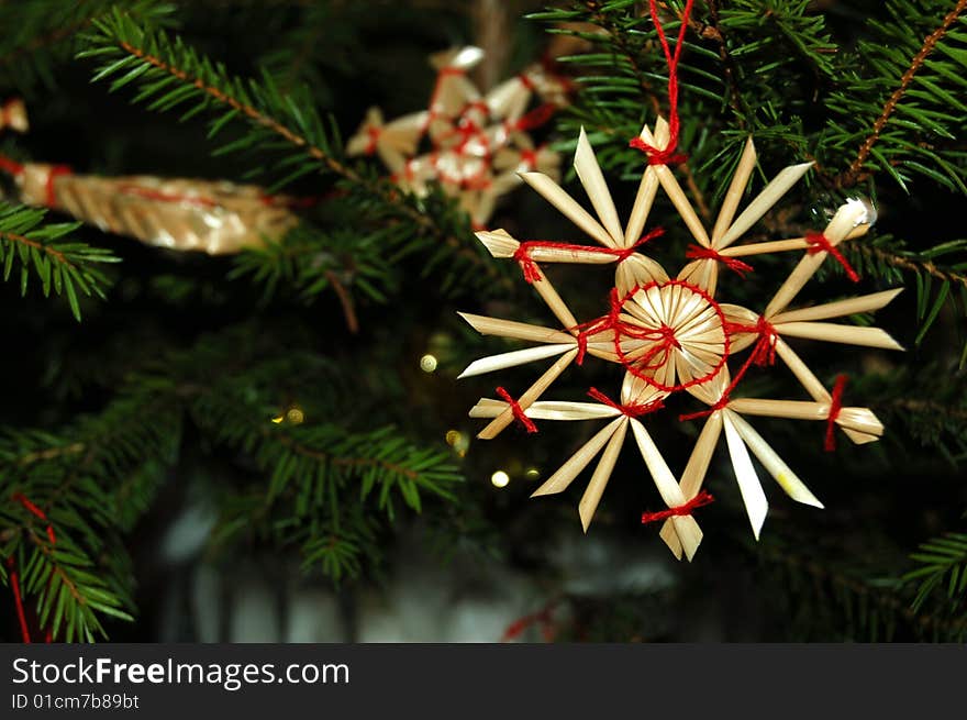 A straw star on the Christmas Tree