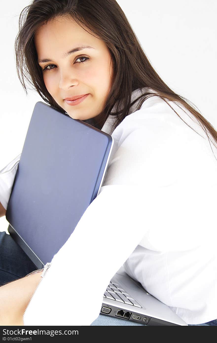 Beautiful young woman with her laptop. Beautiful young woman with her laptop