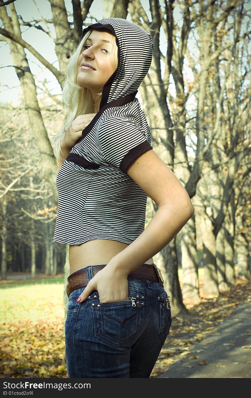 A portrait shot of a girl in park. A portrait shot of a girl in park