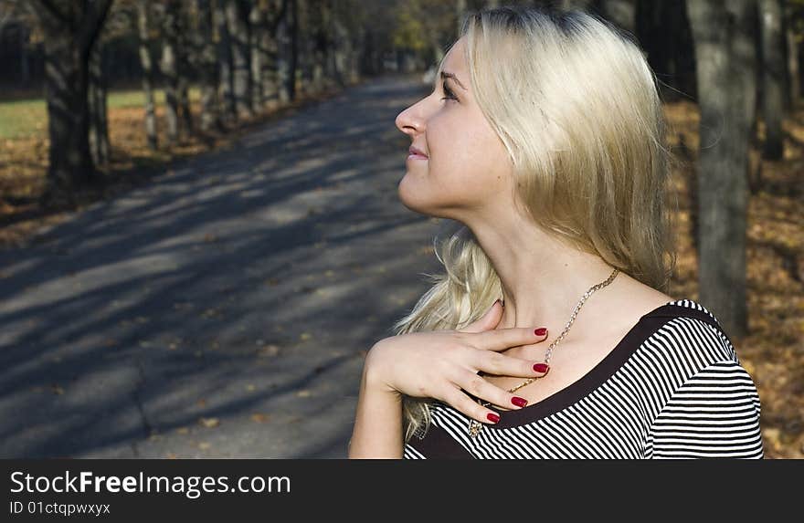 A portrait shot of a girl in park. A portrait shot of a girl in park