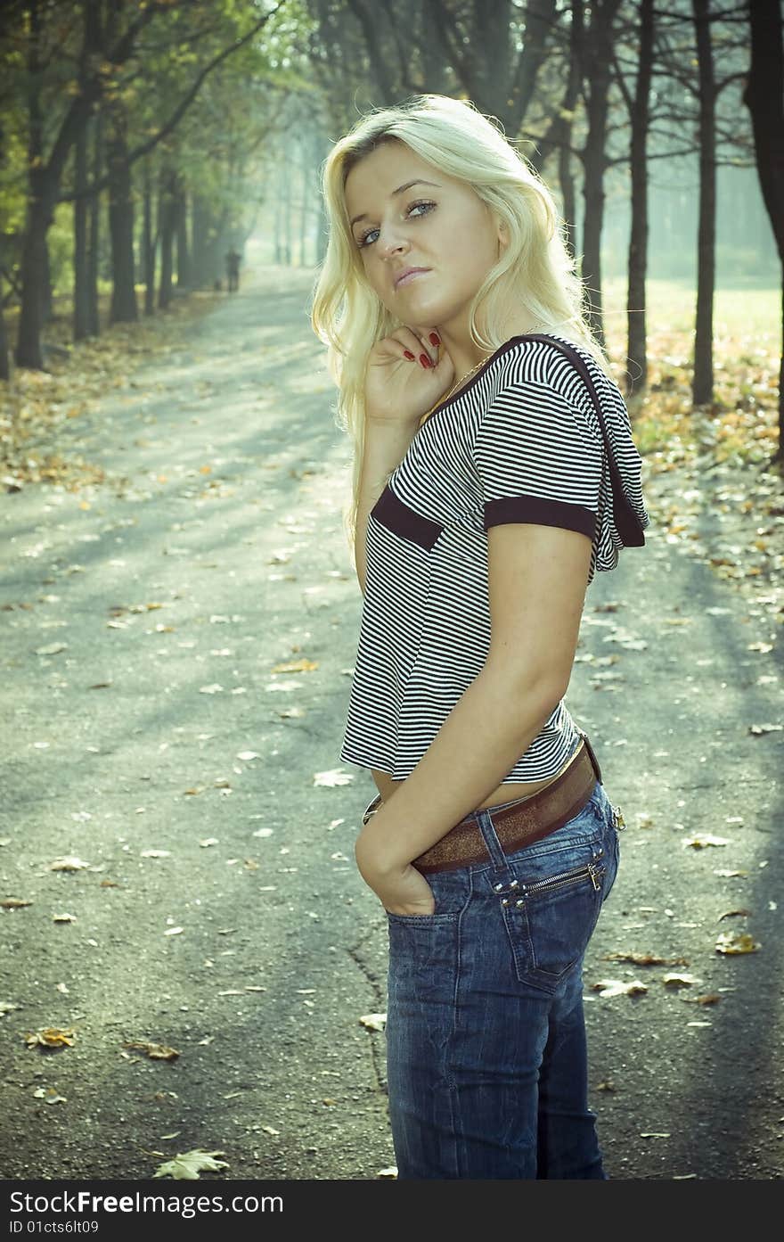 A portrait shot of a girl in park. A portrait shot of a girl in park