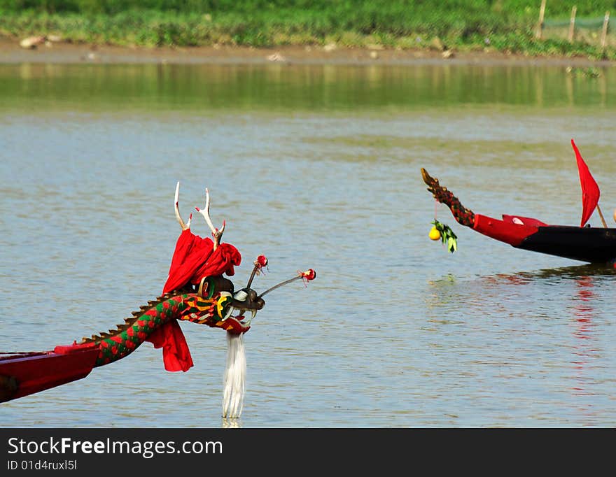 Chinese dragon-boat race is a traditional activity in the South. Chinese dragon-boat race is a traditional activity in the South