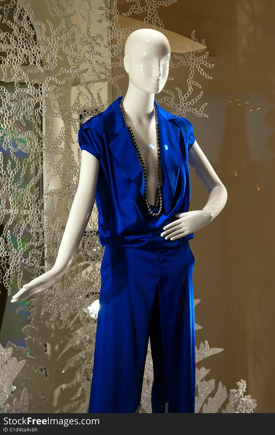 Shop window with clothed mannequin