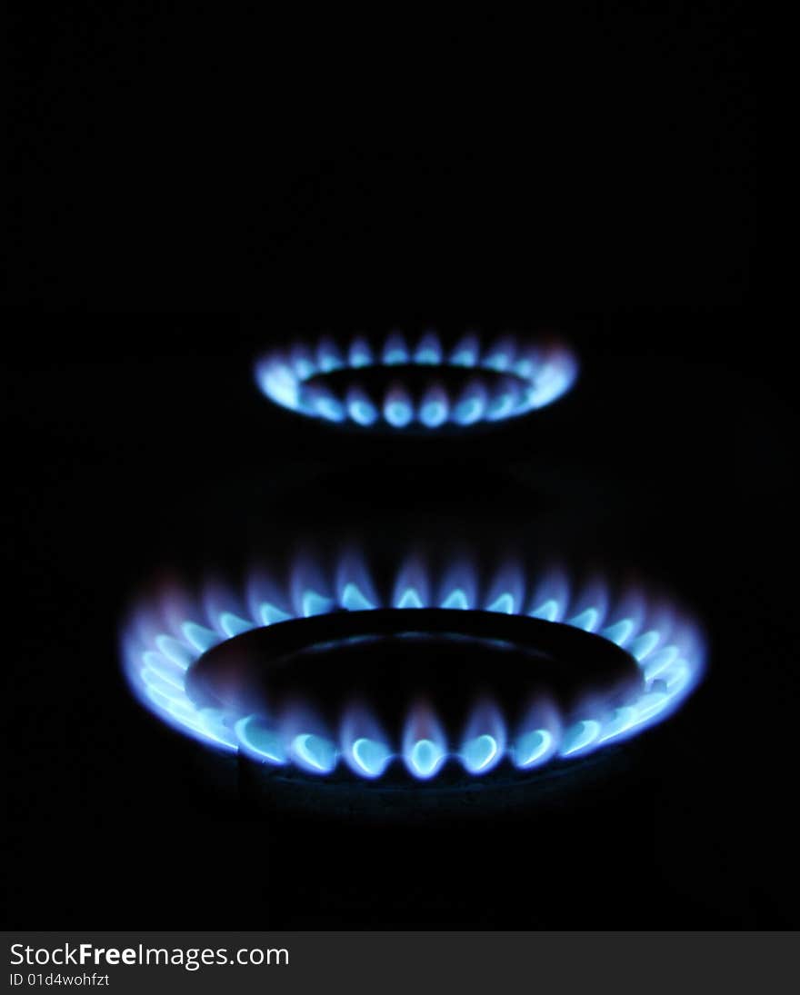 Flames of gas stove in the dark