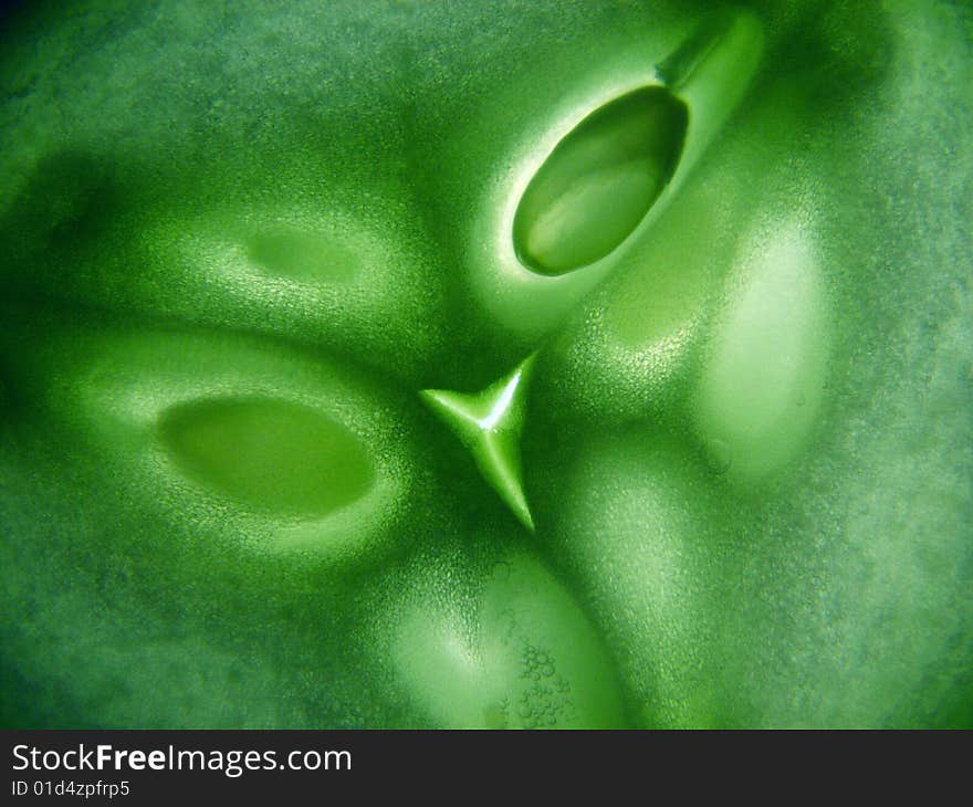 Green cucumber in cut.Abstract image.