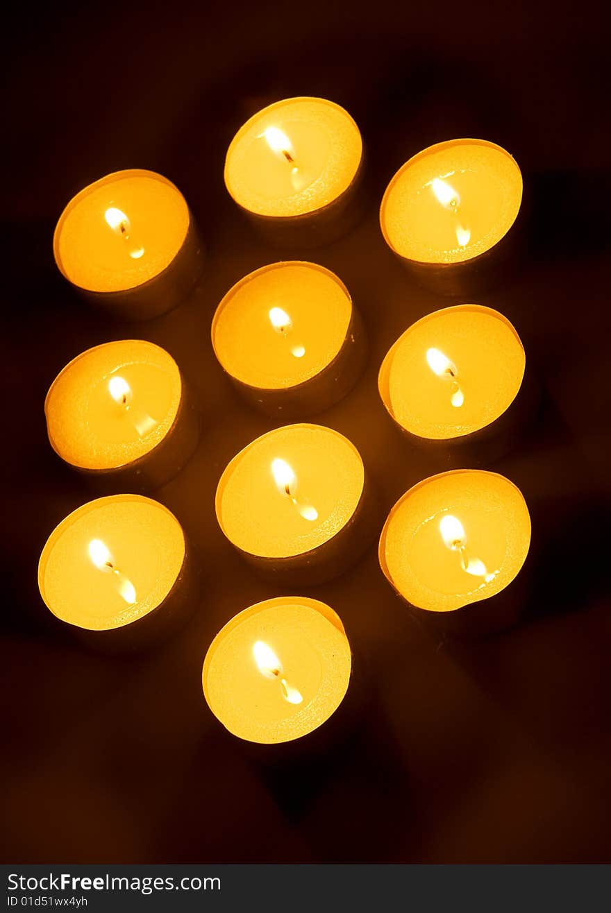 Candle isolated on black background