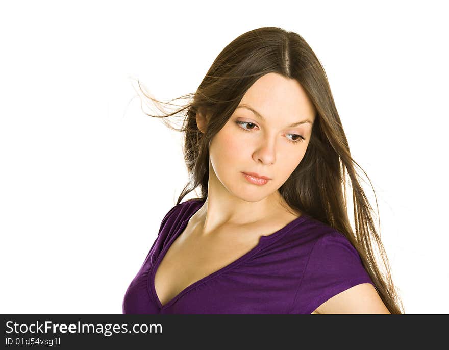 Portrait of young beautiful woman in violet top. Isolated on white background