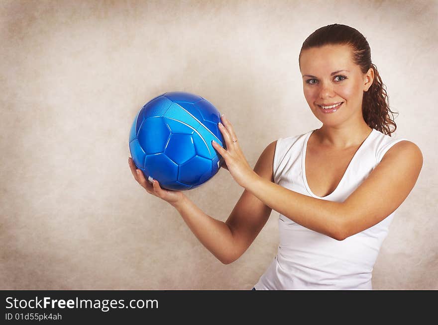 Beautiful girl with ball