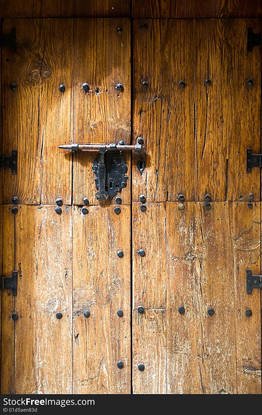 An old iron metal door handle knocker and locker. An old iron metal door handle knocker and locker