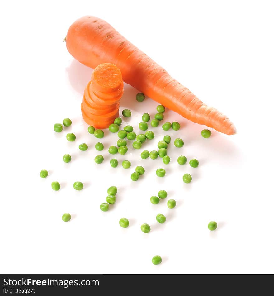 Whole carrot, stacked carrot slices and peas isolated on white background. Whole carrot, stacked carrot slices and peas isolated on white background