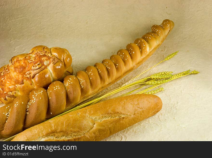 Bakery breads with wheat leaves. Bakery breads with wheat leaves