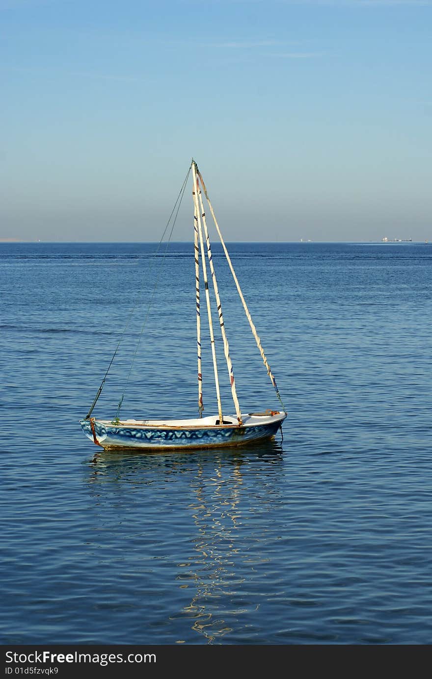 Old boat in the sea water