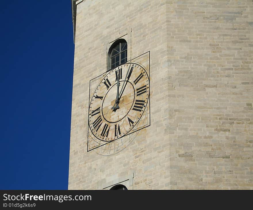 Girona  cathedral clock tower by mid-day