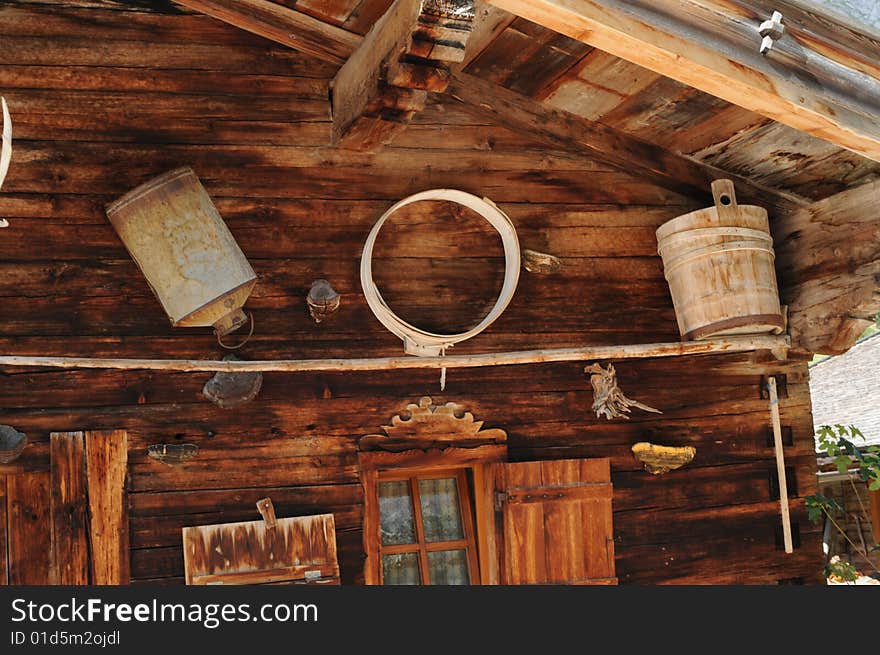 A detail view of a house in an alpine valley. A detail view of a house in an alpine valley.