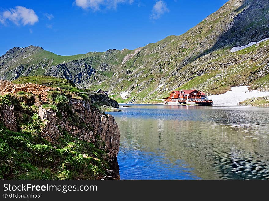 Cabin next to a lake