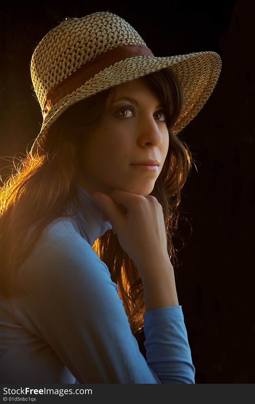 Young Lady With Straw Hat On