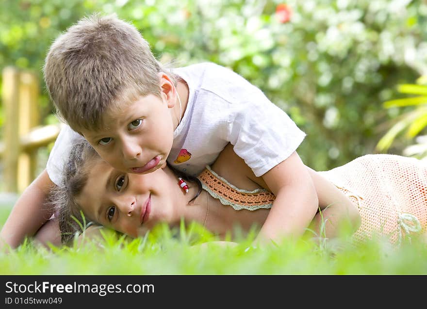 Portrait of little kids having good time in summer environment. Portrait of little kids having good time in summer environment