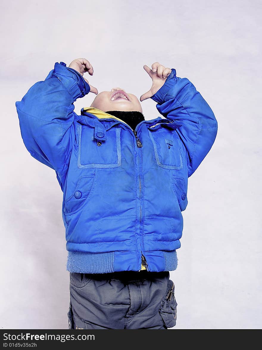 Boy Laughing And Facing Upward