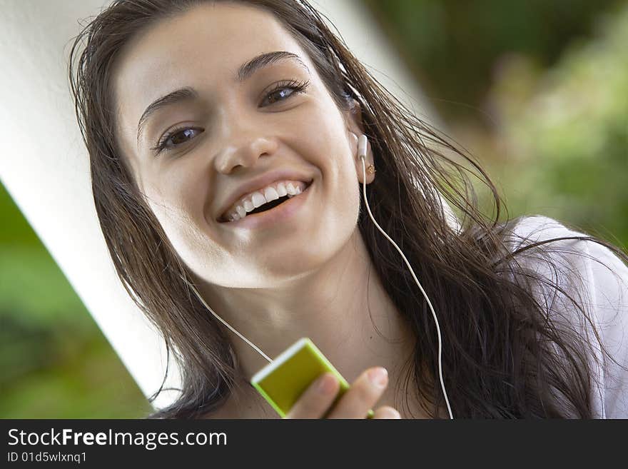 Portrait of young pretty woman in summer environment. Portrait of young pretty woman in summer environment