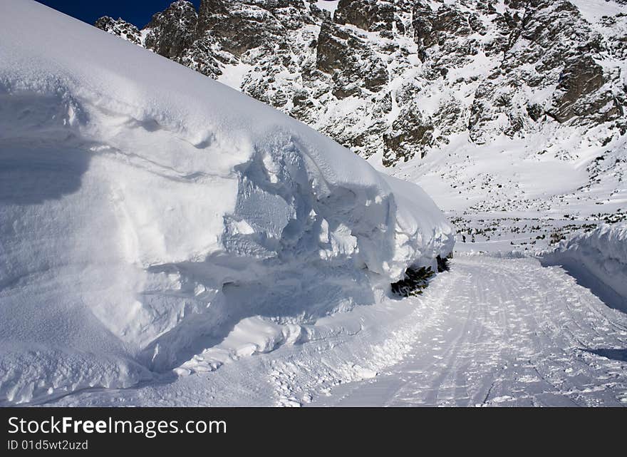 The winter road in mountains