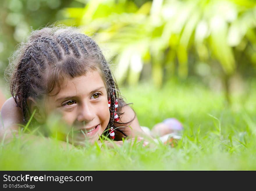 Portrait of little girl having good time in summer environment. Portrait of little girl having good time in summer environment