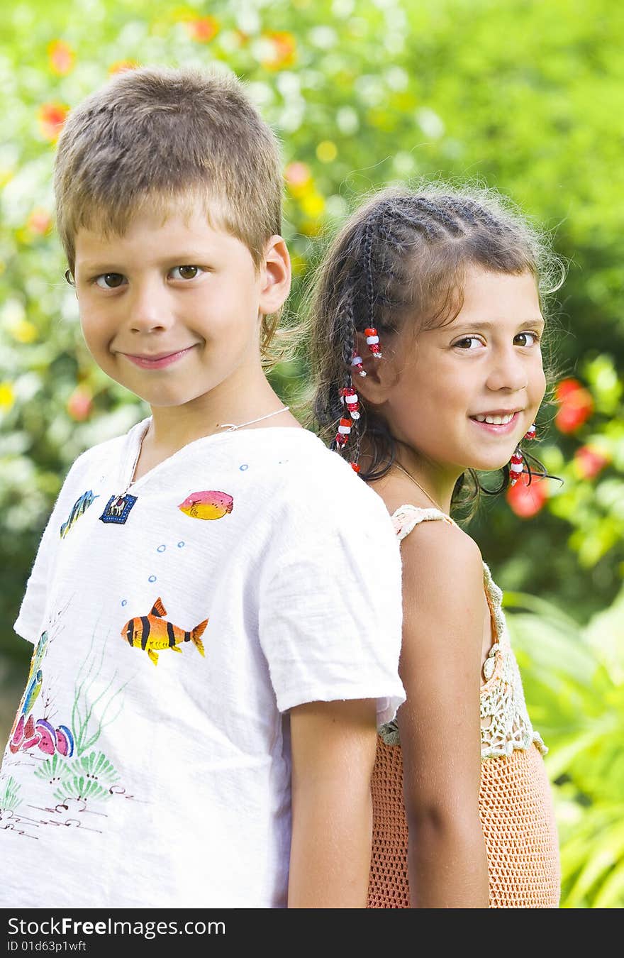 Portrait of little kids having good time in summer environment. Portrait of little kids having good time in summer environment