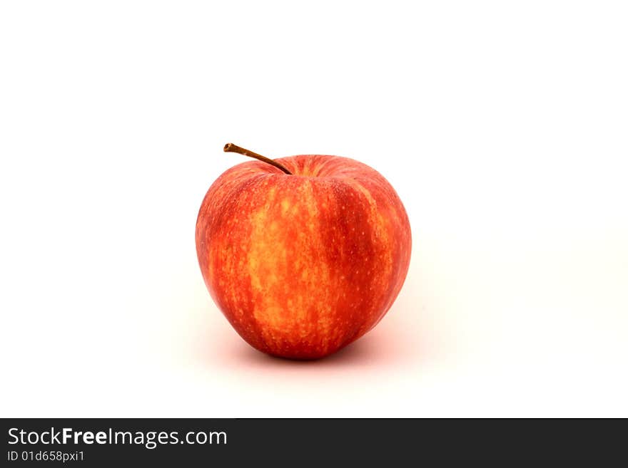 A red apple on a white background. A red apple on a white background