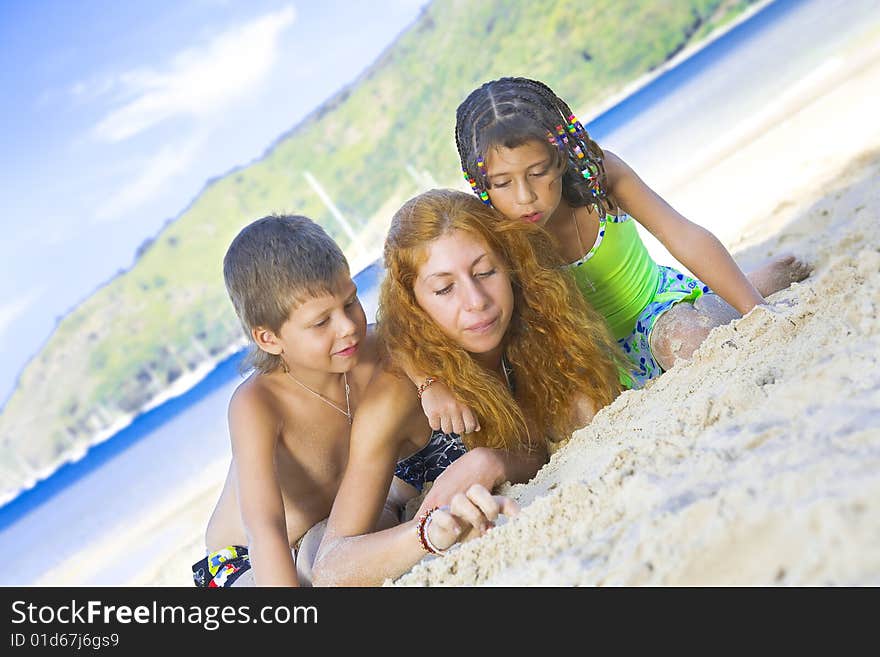 Portrait of little kids with mama  having good time in summer environment. Portrait of little kids with mama  having good time in summer environment