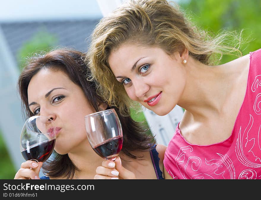 Portrait of two young attractive girls having good time. Portrait of two young attractive girls having good time