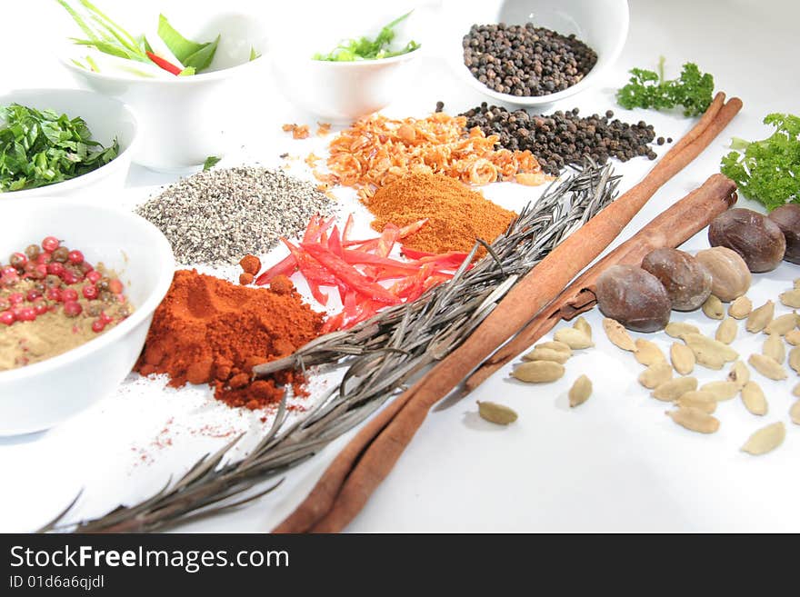 Herbs and spices on white background