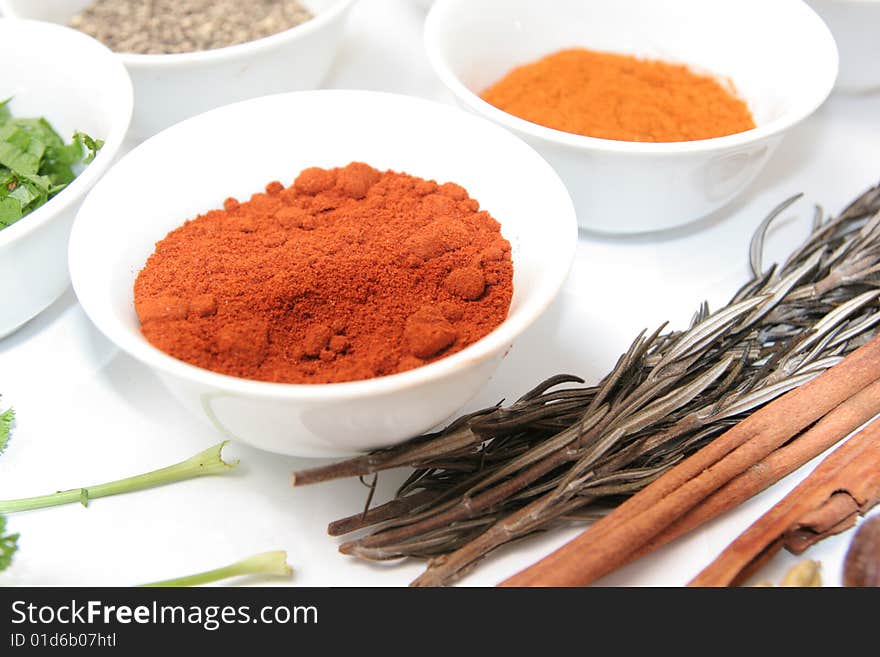 Herbs and spices on white background