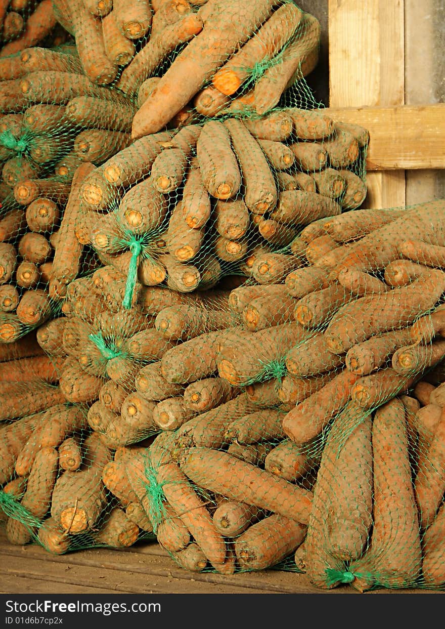 Stocked carrots in reticular bags