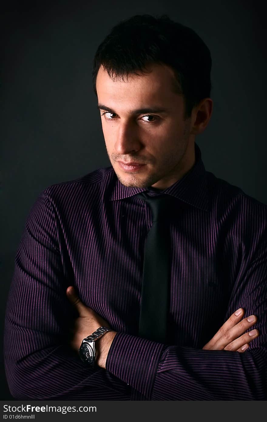 Young man on a black background