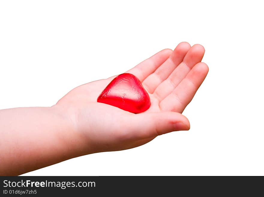 Child hand with candy isolated on white