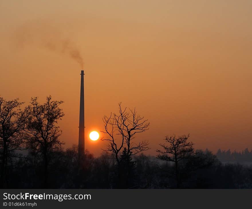 Chimney And Sunset