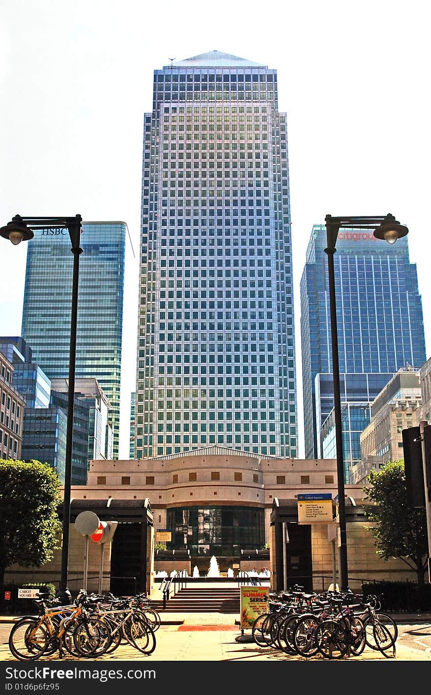 Three buildings in London, plenty bicycles in front. Three buildings in London, plenty bicycles in front.