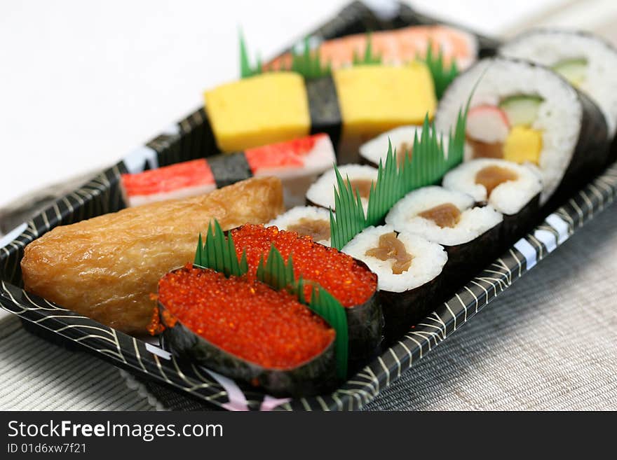 Prepared and delicious japanese sushi taken in studio. Prepared and delicious japanese sushi taken in studio