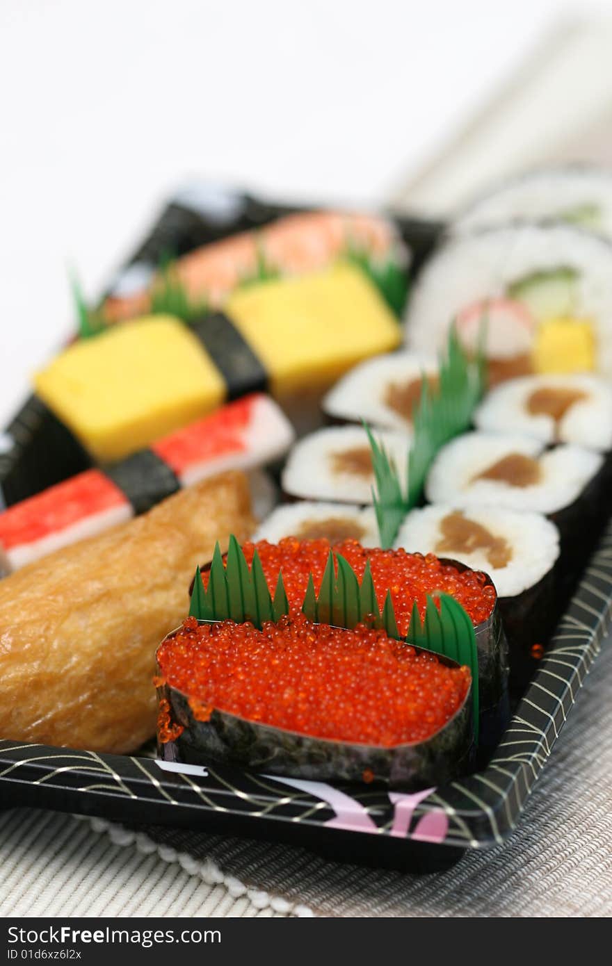 Prepared and delicious japanese sushi taken in studio. Prepared and delicious japanese sushi taken in studio