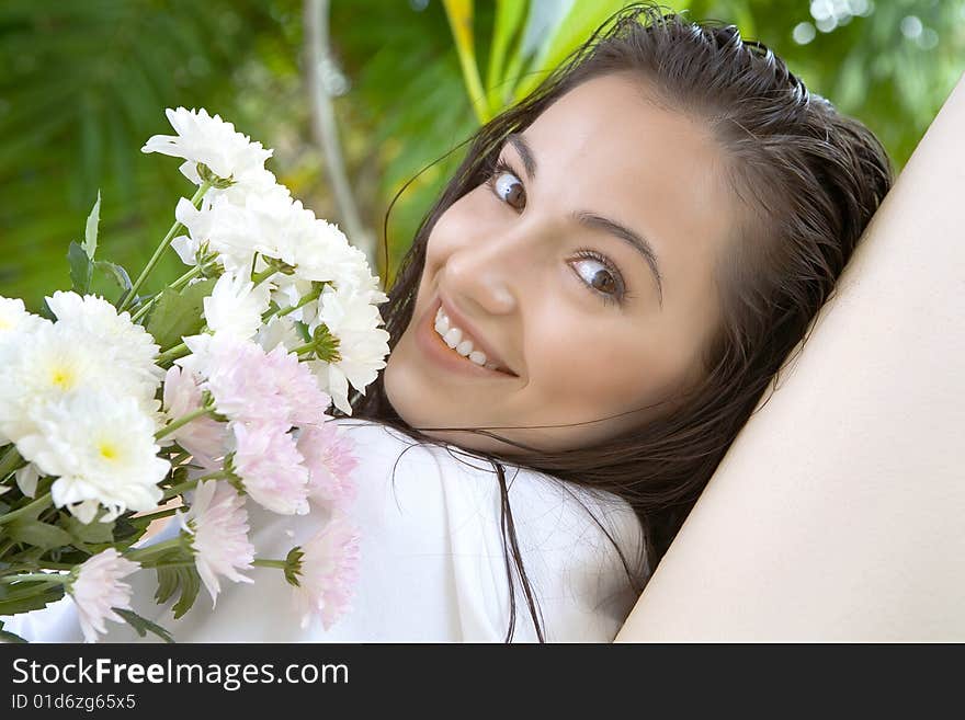 Portrait of young pretty woman in summer environment. Portrait of young pretty woman in summer environment