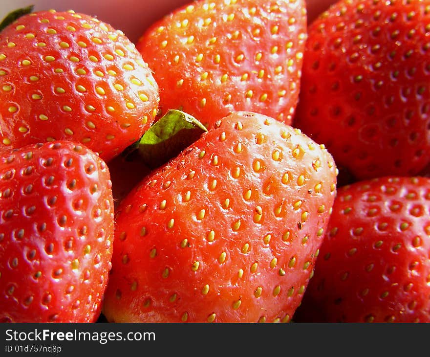 Close-up shot of red fresh strawberry. Close-up shot of red fresh strawberry.