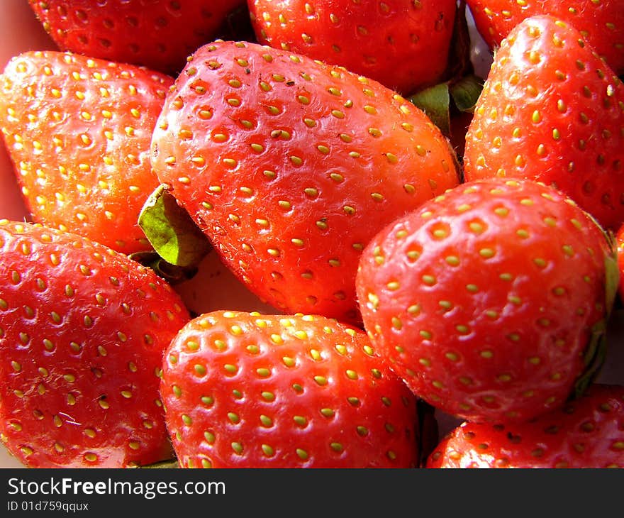 Close-up shot of red fresh strawberry. Close-up shot of red fresh strawberry.