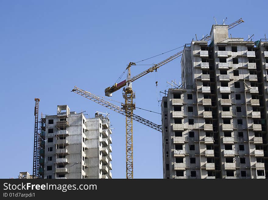 The crane which builds a building. The crane which builds a building