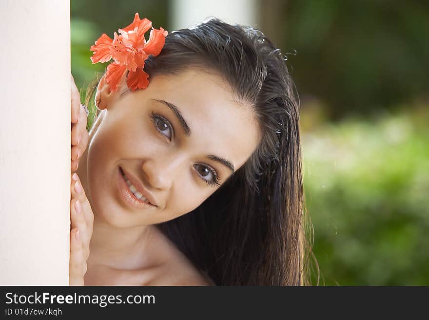 Portrait of young pretty woman in summer environment. Portrait of young pretty woman in summer environment