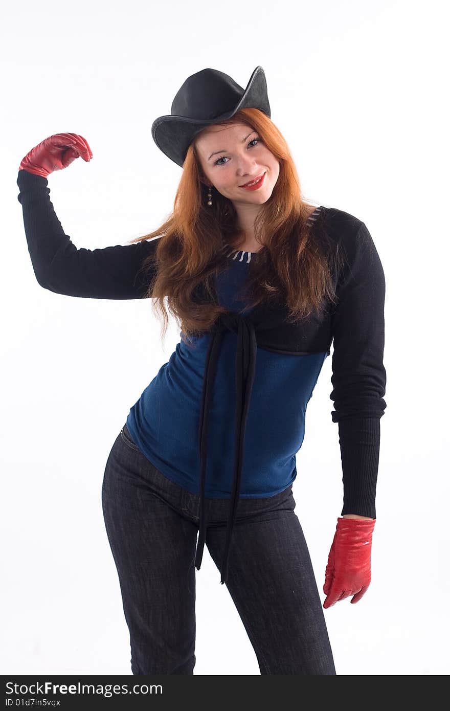 Young girl with red gloves and black hat standing on white background. Young girl with red gloves and black hat standing on white background