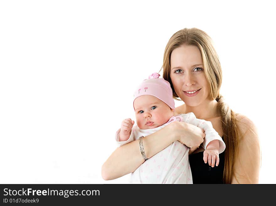 Happy mother holding a young baby girl. Isolated on white background. Happy mother holding a young baby girl. Isolated on white background.