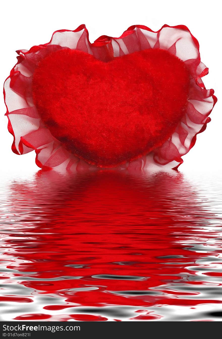 Red heart-shaped valentines with reflection in water to background