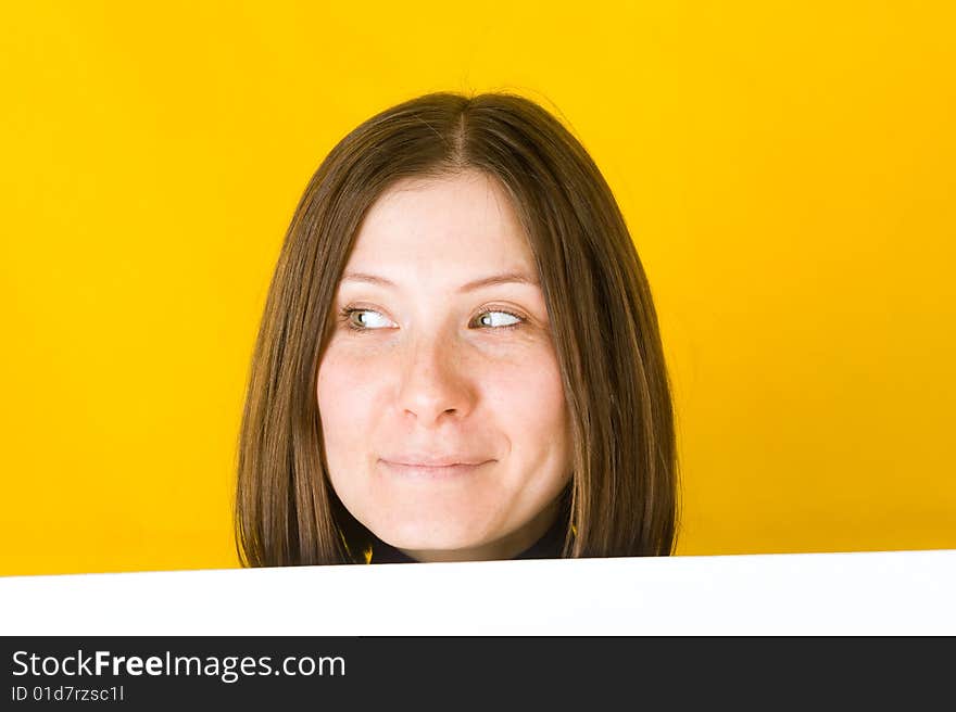 Beautiful woman looking into the left corner.