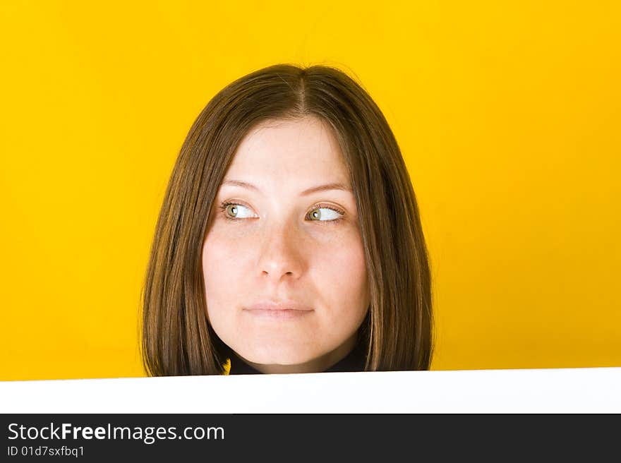 Beautiful Woman Looking Into The Left Corner.